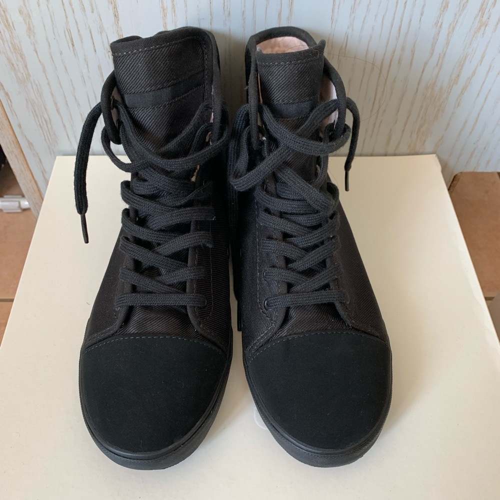 Vans high cut sneakers. Brand new never worn.
